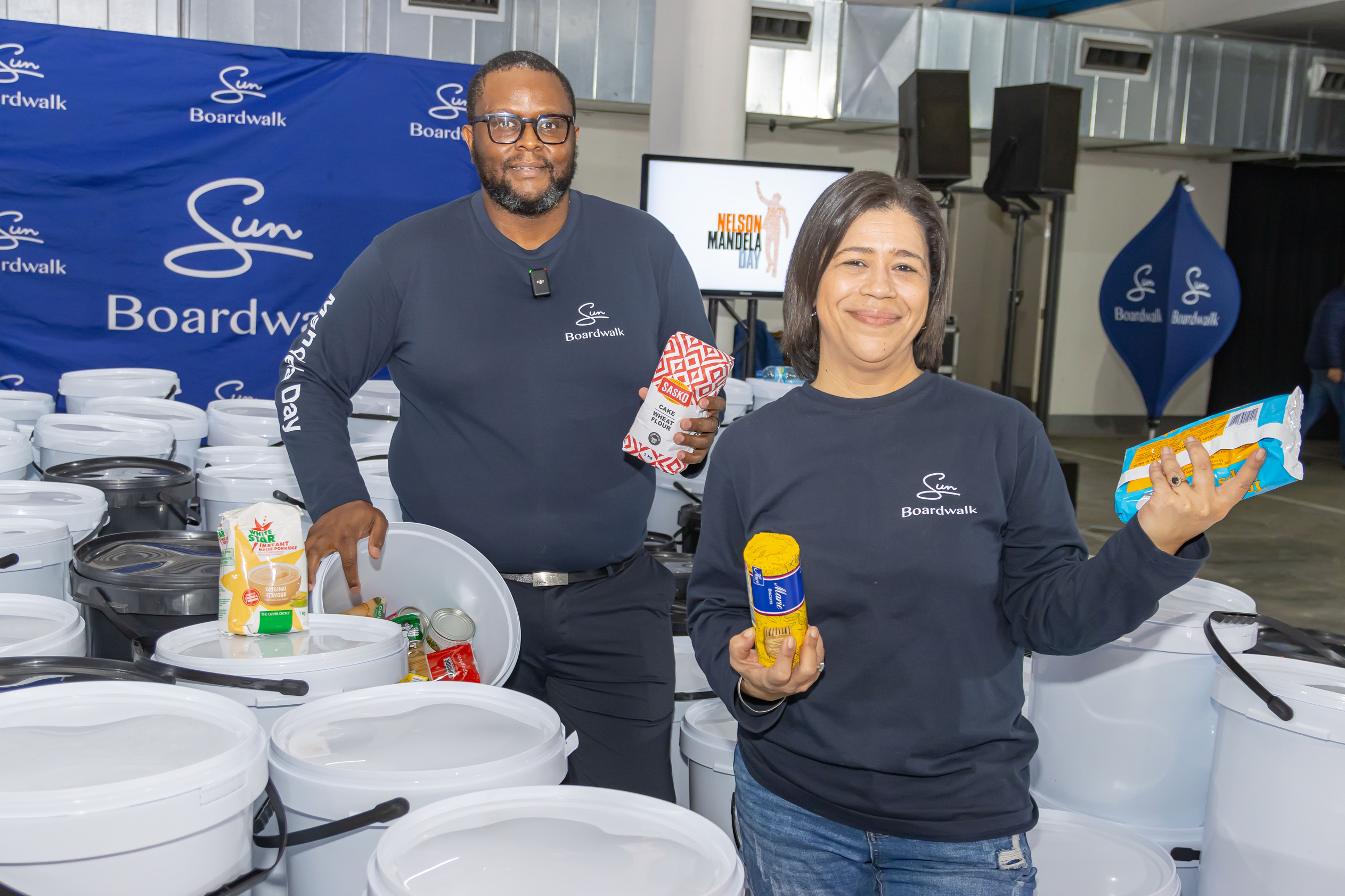 Boardwalk GM Tati Tsunke and Shanaaz Borman Executive Secretary at the Mandela Day meal packing event